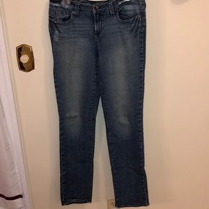 Mildly distressed med wash jeans size 11 tall